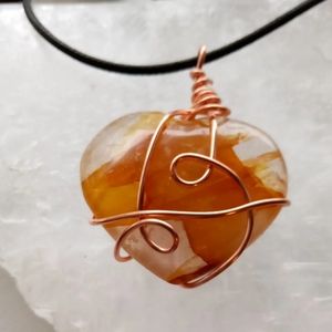 Golden healer heart pendant
